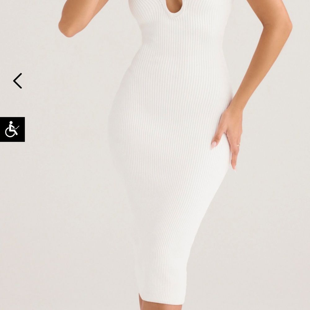 The white Oriana dress from house of CB. Brand new in box/with tags! Never worn.